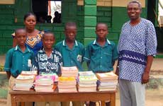 Brother Nee with pupils of Elmina Catholic Boys' Primary School